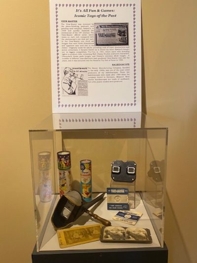 Ex 3 Display featuring kaleidescope and viewfinders in the "It's all fun and games" exhibit at the Bartow History Museum